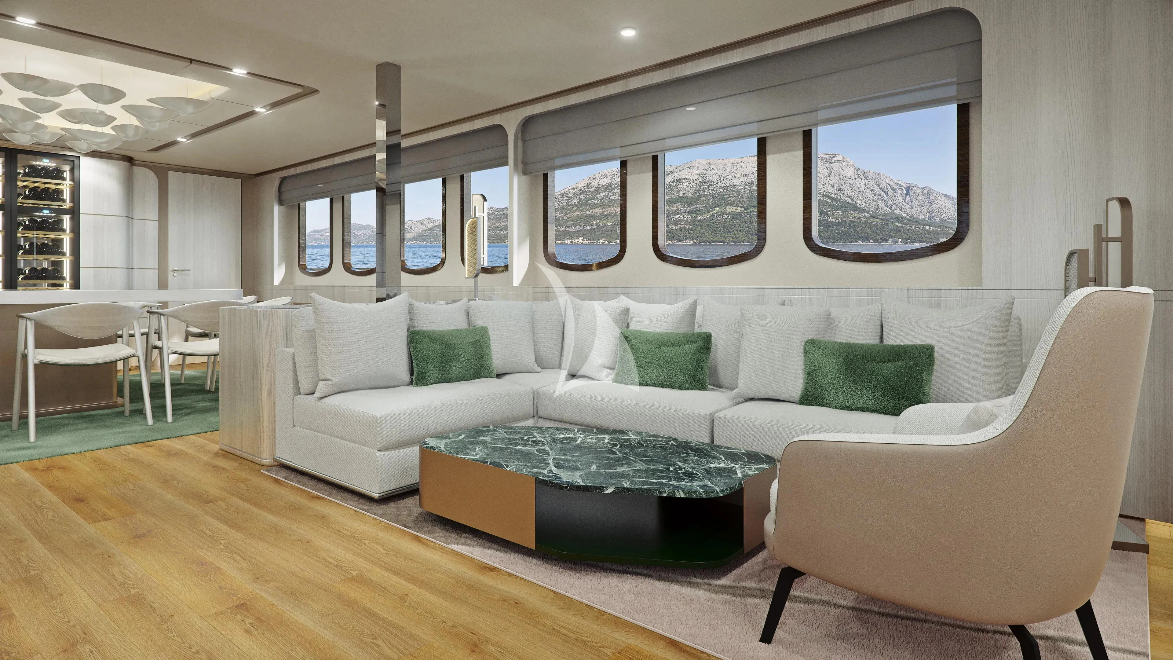a living room with a couch and a table aboard MAIA Yacht for Sale