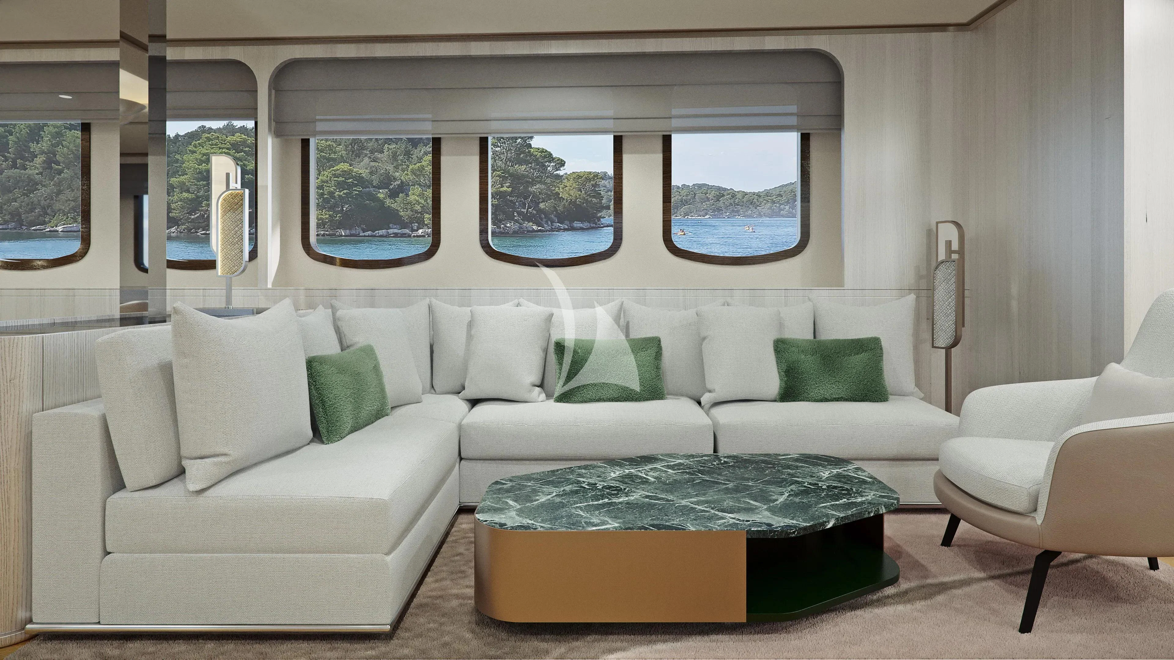 a living room with a couch and a table aboard MAIA Yacht for Sale
