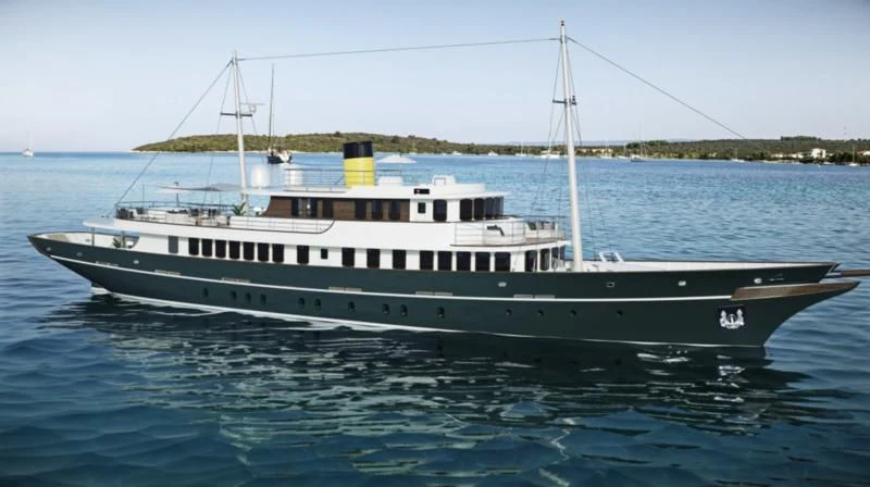 a large white boat in the water aboard MAIA Yacht for Sale