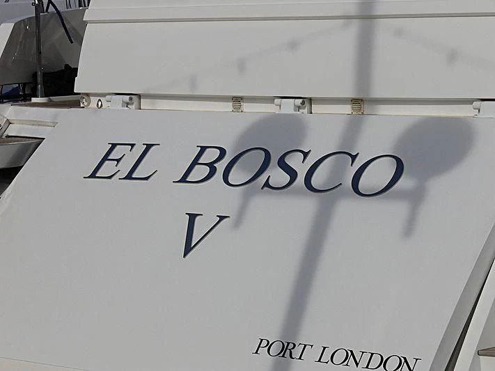 a white sign with black text aboard BABY I Yacht for Sale