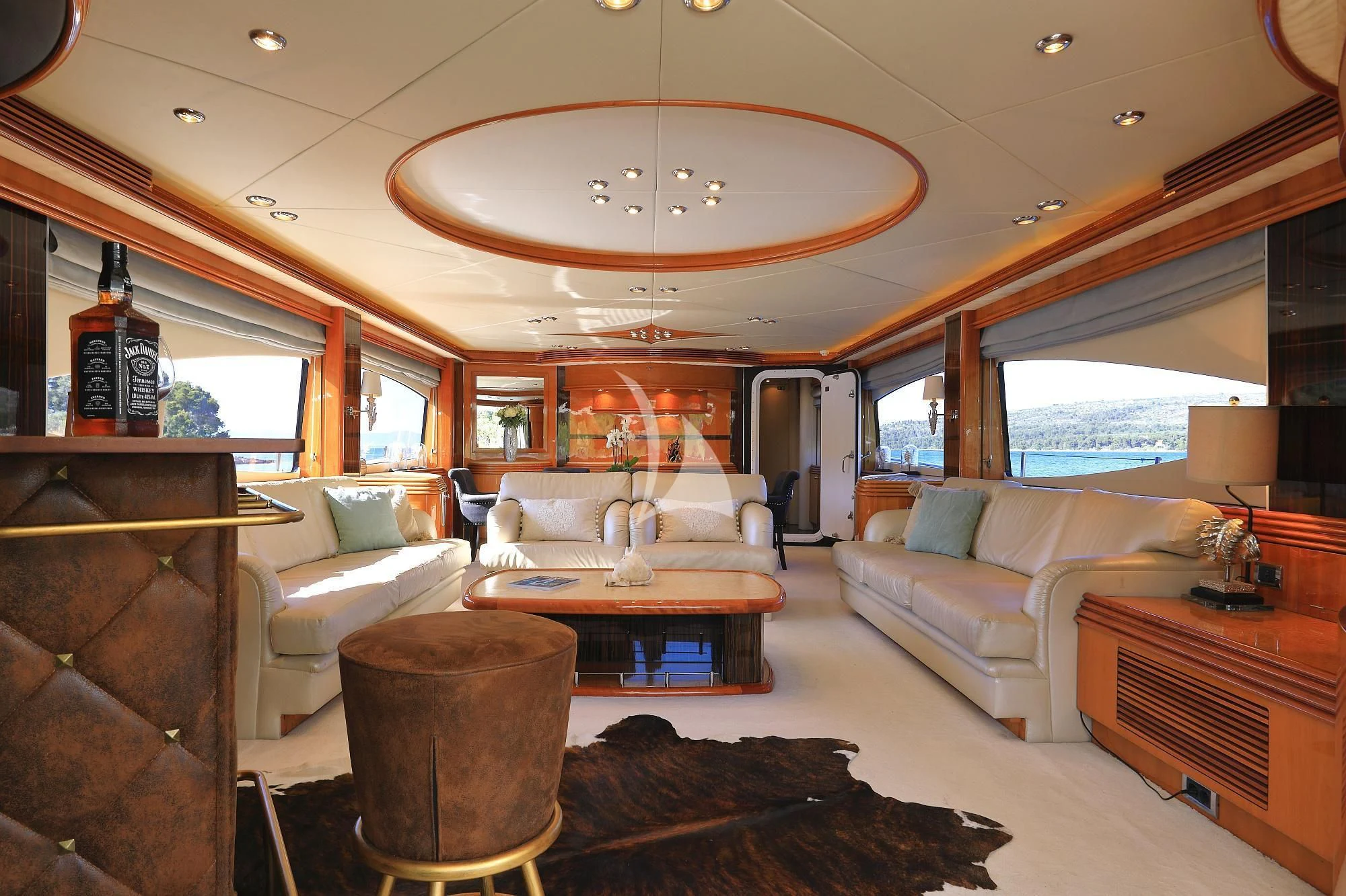 a living room with a large window aboard BABY I Yacht for Sale
