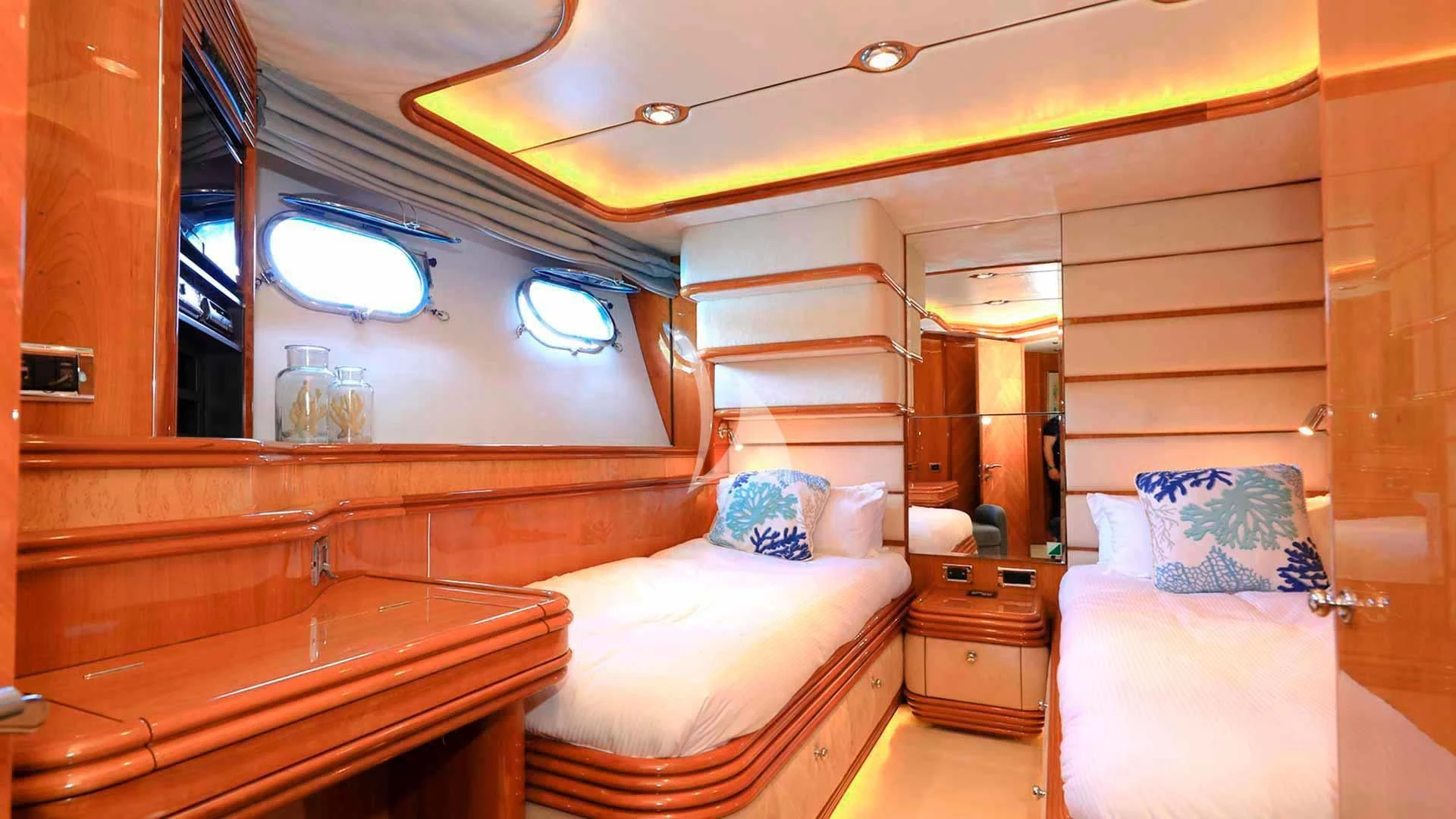 a room with a bed and a mirror aboard BABY I Yacht for Sale