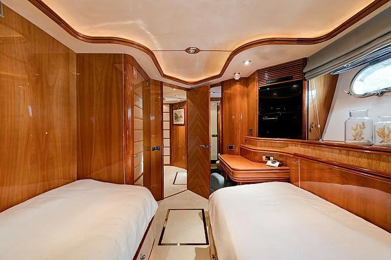 a room with a bed and a mirror aboard BABY I Yacht for Sale