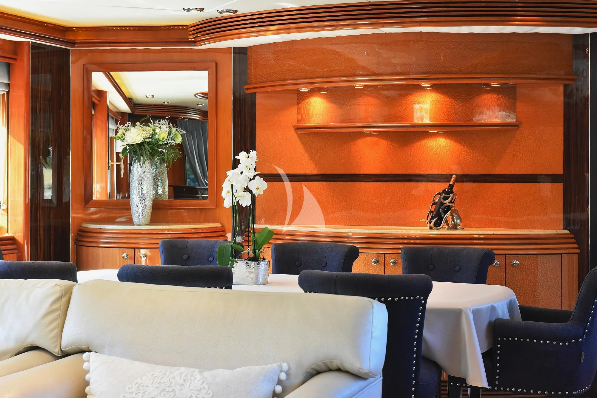 a room with a vase of flowers aboard BABY I Yacht for Sale