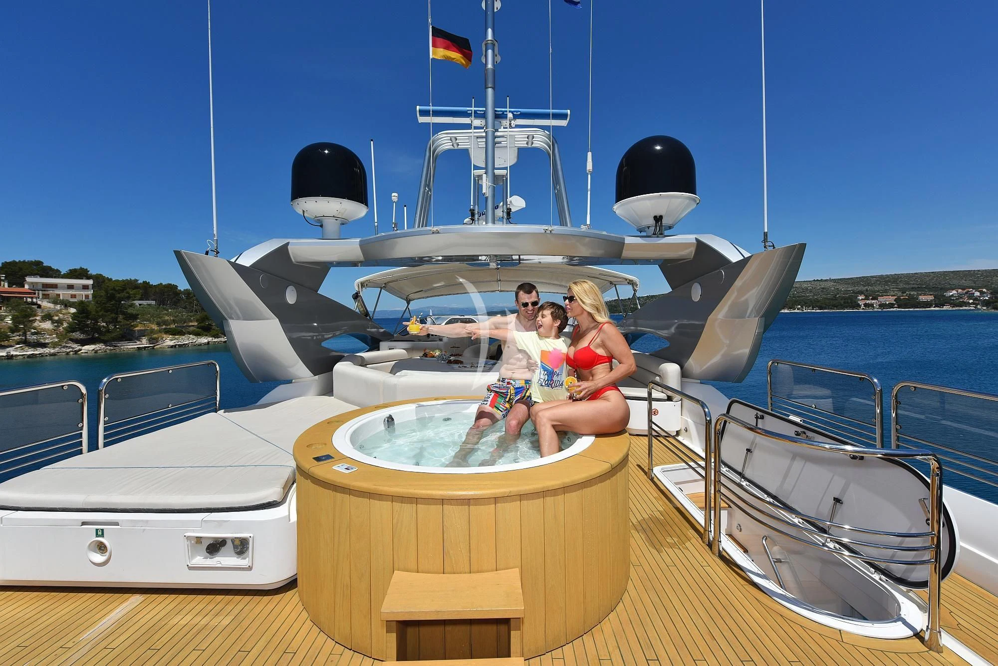 a group of people sitting on a boat aboard BABY I Yacht for Sale