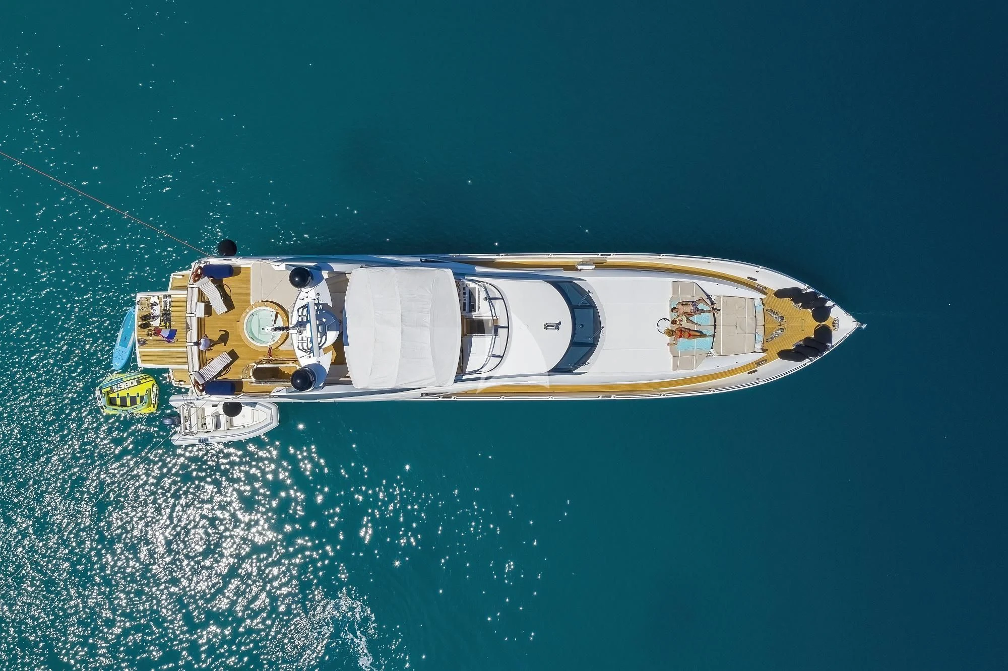 a yellow and white boat in the water aboard BABY I Yacht for Sale