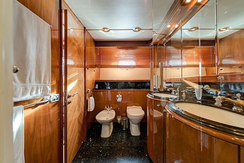 a bathroom with a toilet and sink aboard BABY I Yacht for Sale