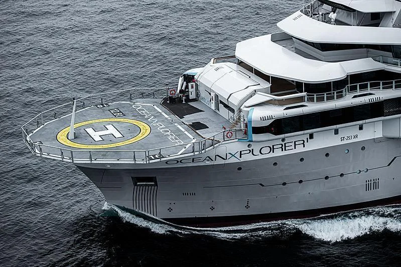 a large ship in the water aboard OCEANXPLORER 1 Yacht for Sale