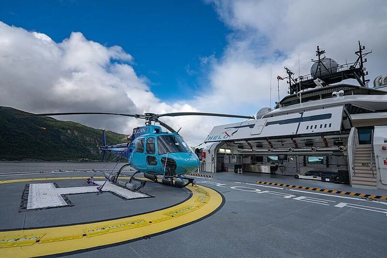 a helicopter on a road aboard OCEANXPLORER 1 Yacht for Sale