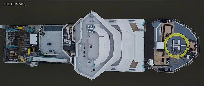 a large white and black machine aboard OCEANXPLORER 1 Yacht for Sale