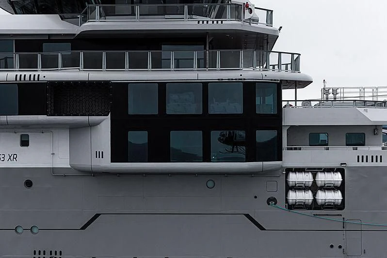 a white building with windows aboard OCEANXPLORER 1 Yacht for Sale
