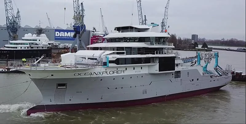 a large white boat in the water aboard OCEANXPLORER 1 Yacht for Sale