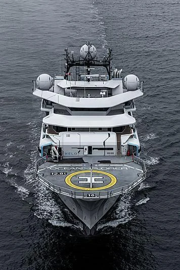 a large ship in the water aboard OCEANXPLORER 1 Yacht for Sale