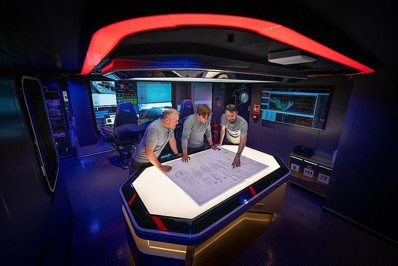 a group of people in a vehicle aboard OCEANXPLORER 1 Yacht for Sale