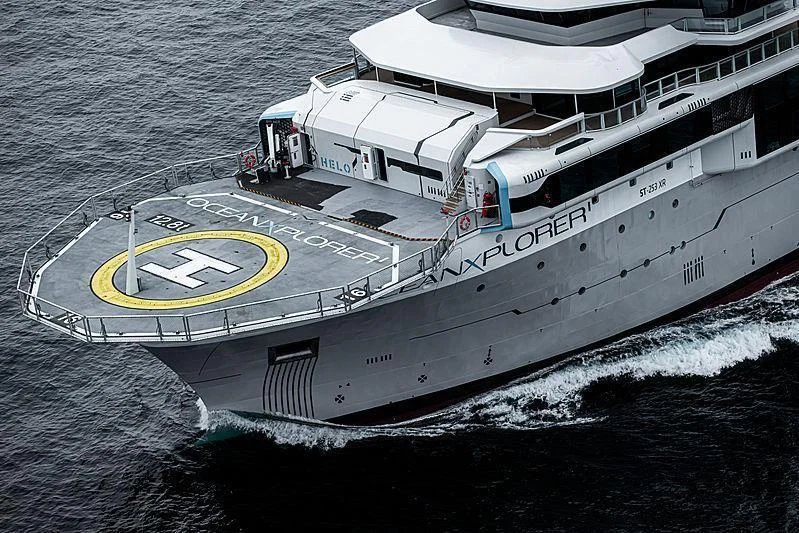 a large ship in the water aboard OCEANXPLORER 1 Yacht for Sale