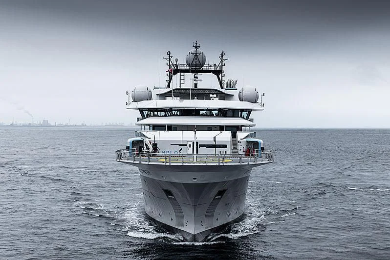 a large ship in the water aboard OCEANXPLORER 1 Yacht for Sale