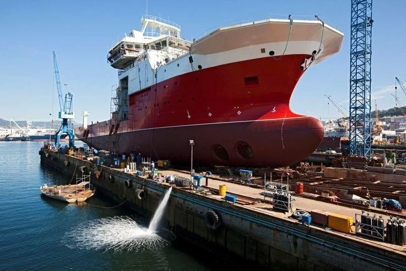 a large red and white ship aboard OCEANXPLORER 1 Yacht for Sale