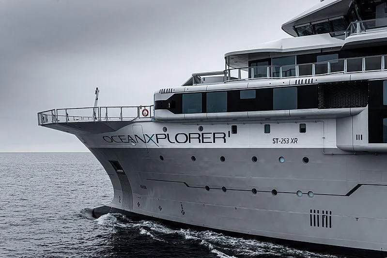 a large white boat on the water aboard OCEANXPLORER 1 Yacht for Sale