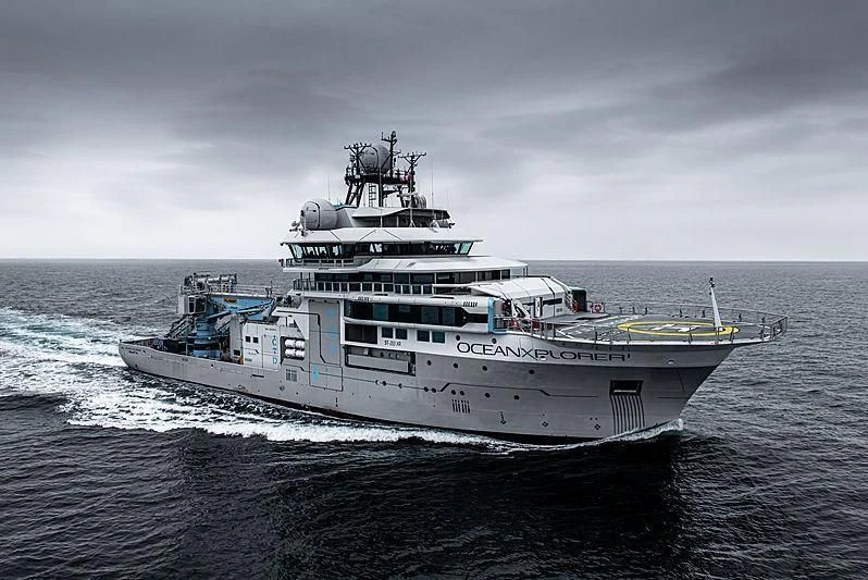a large ship on the water aboard OCEANXPLORER 1 Yacht for Sale