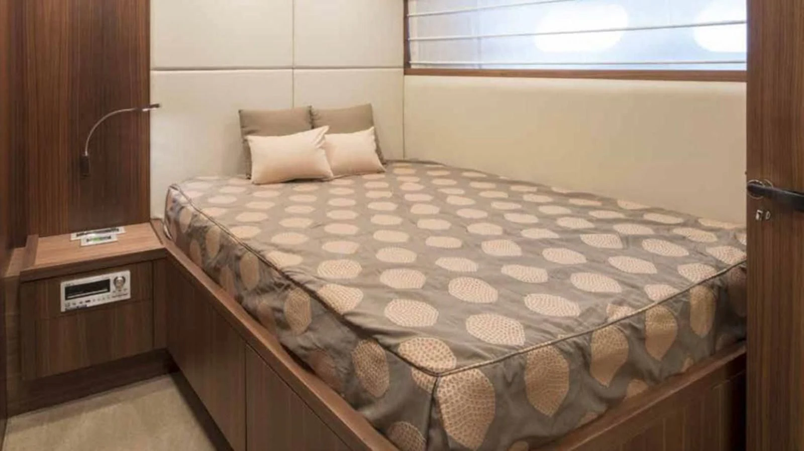 a bed with a white comforter aboard MARIS STELLA Yacht for Sale