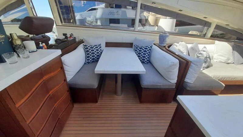 a room with a couch and a table aboard PALOMA Yacht for Sale