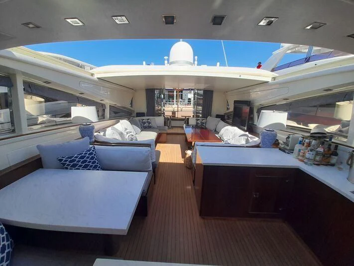 a room with a bed and a couch aboard PALOMA Yacht for Sale