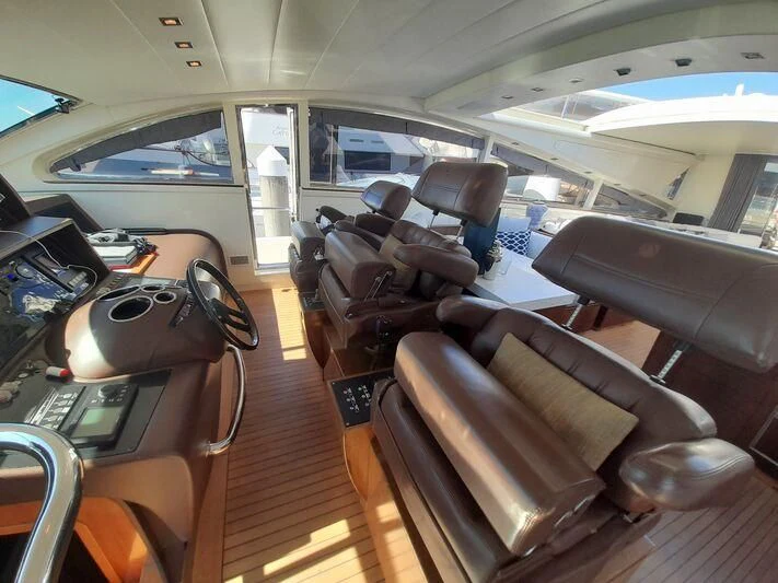inside of a vehicle with seats aboard PALOMA Yacht for Sale