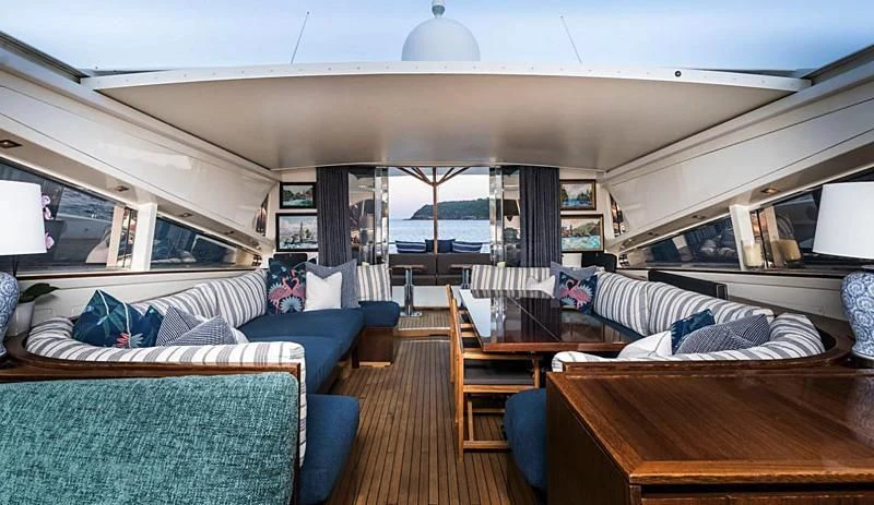 a room with a bed and a couch aboard PALOMA Yacht for Sale