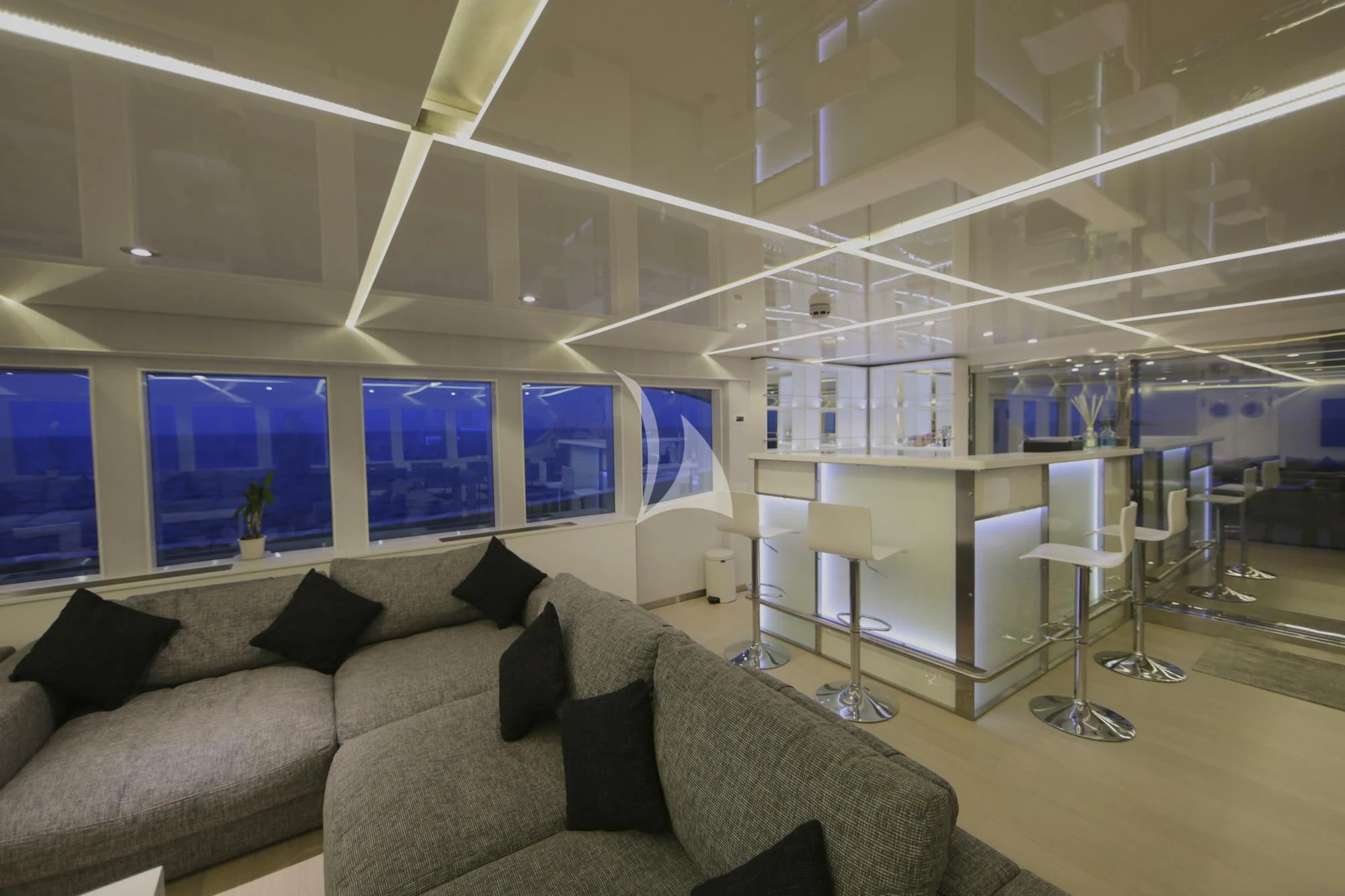 a room with couches and a table aboard SEAREX Yacht for Sale