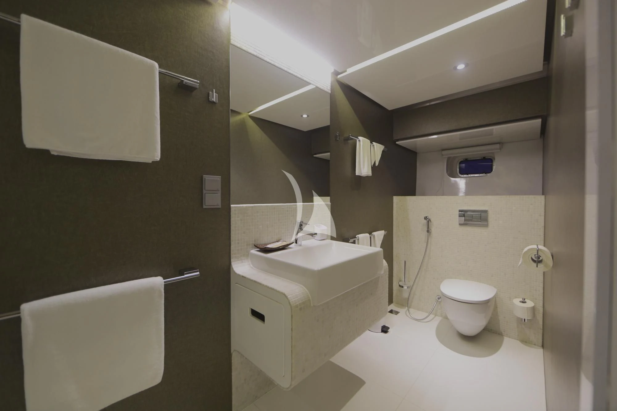 a bathroom with a toilet and sink aboard SEAREX Yacht for Sale