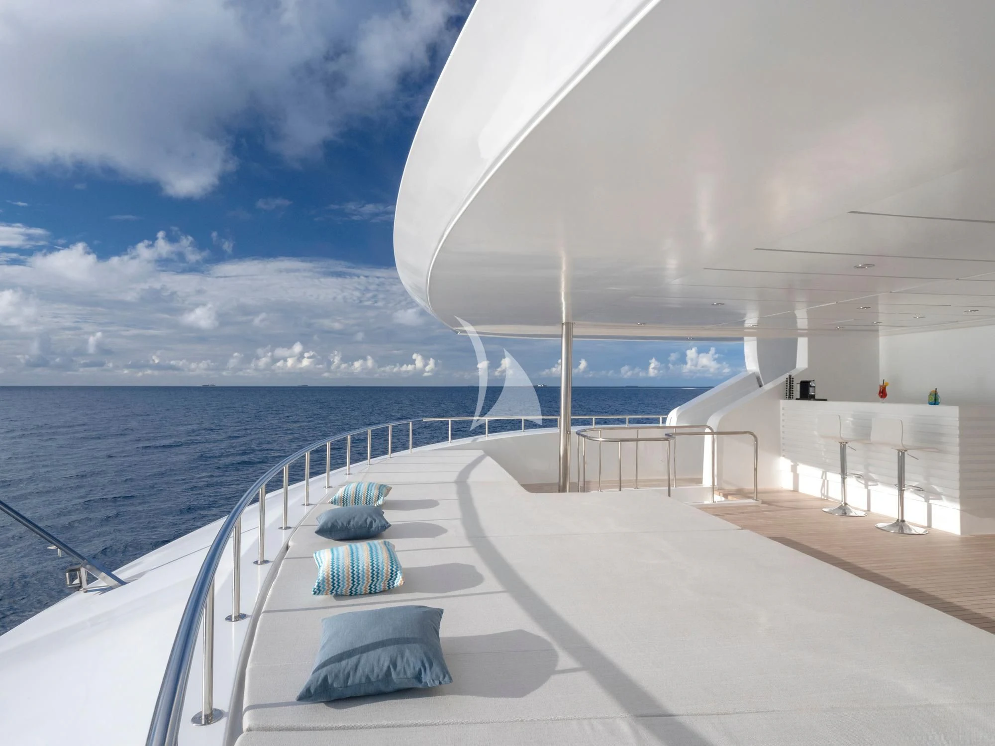 a boardwalk leading to the ocean aboard SEAREX Yacht for Sale