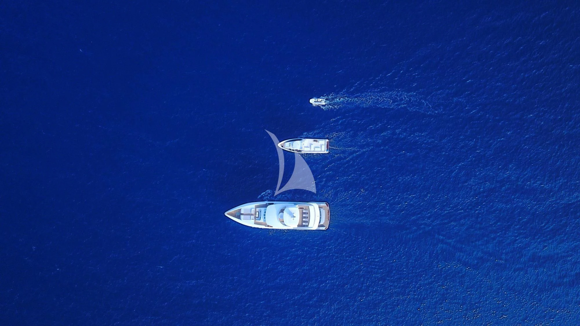 a small boat in the water aboard SEAREX Yacht for Sale