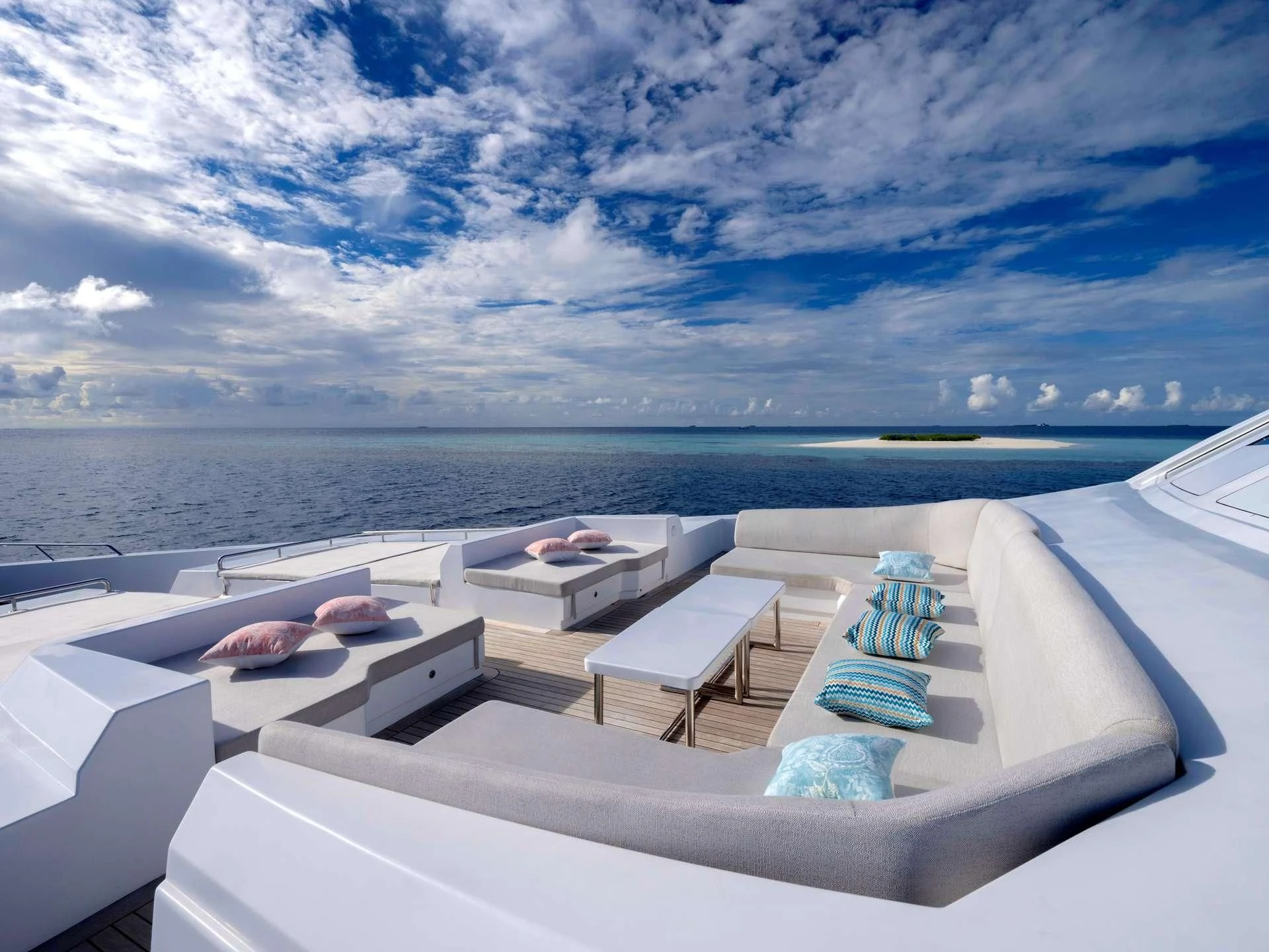 a room with a bed and a view of the ocean aboard SEAREX Yacht for Sale