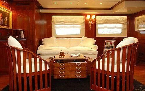 a bed and a baby in a room aboard DADDY SHANE Yacht for Sale