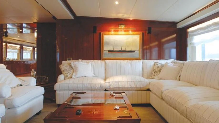 a living room with a couch and a coffee table aboard DADDY SHANE Yacht for Sale