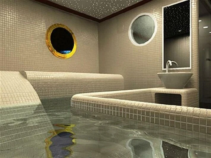 a bathroom with a tub and sink aboard DADDY SHANE Yacht for Sale