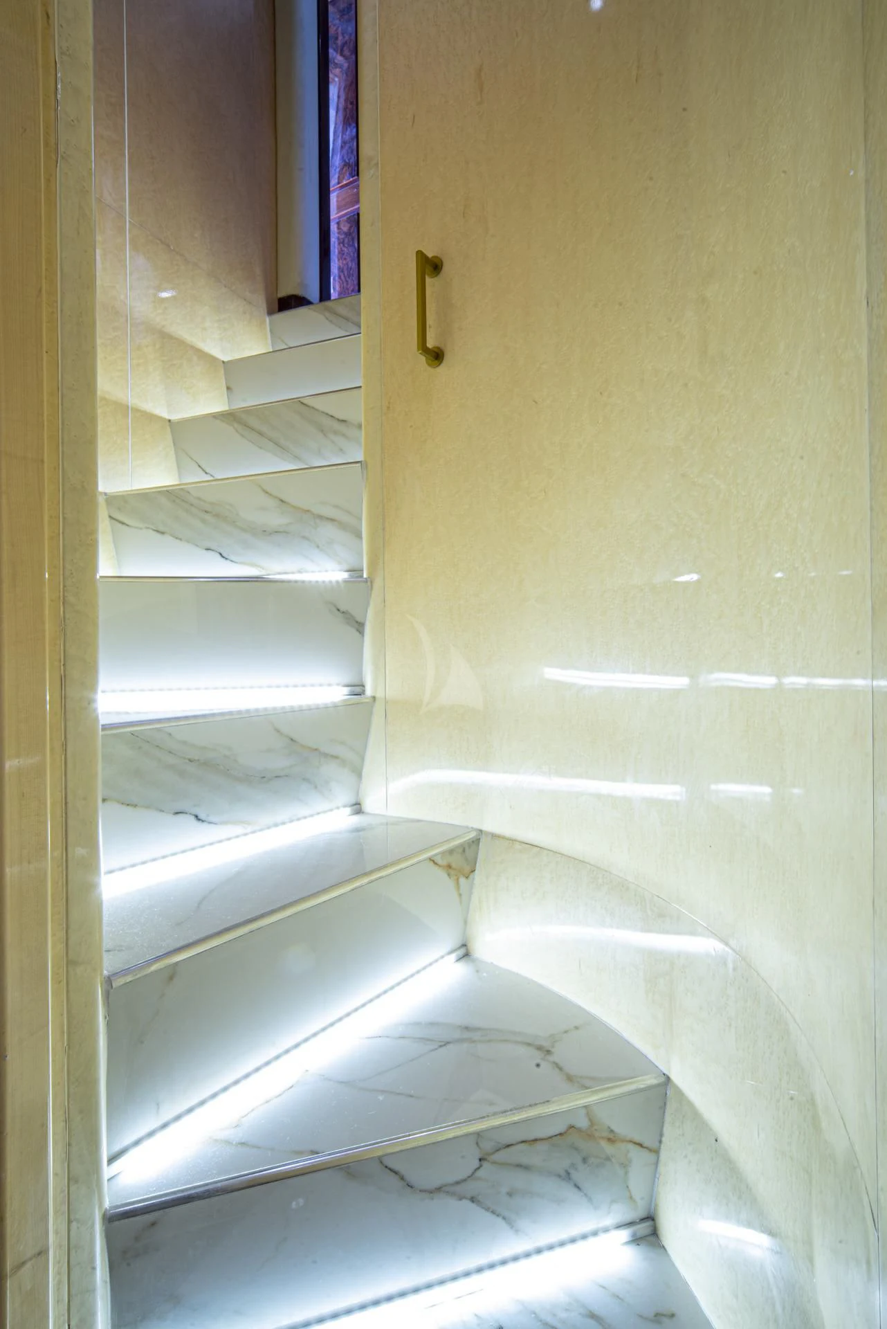 a white shelf with a book on it aboard WISH Yacht for Sale