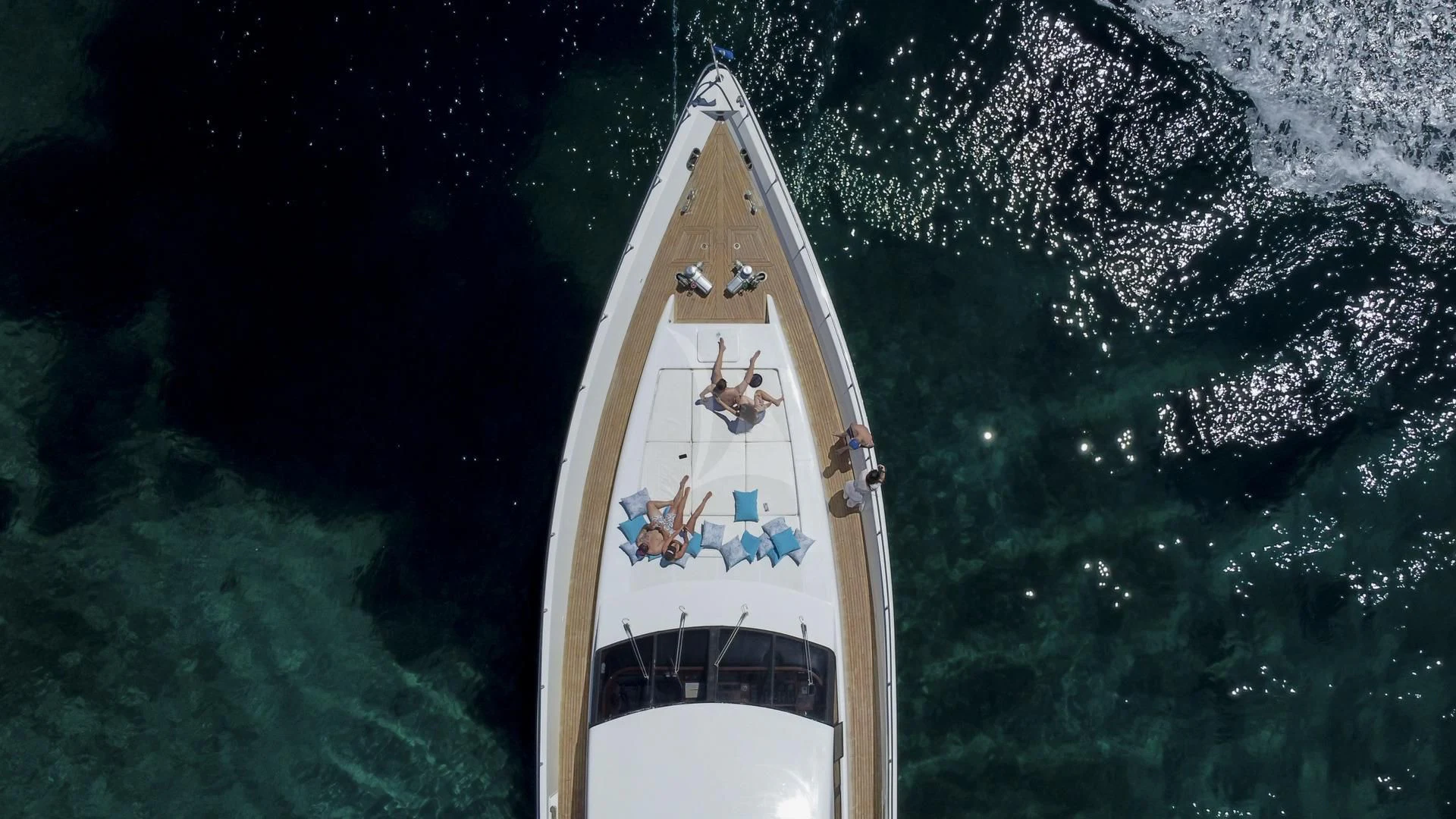 a space shuttle flying over the earth aboard WISH Yacht for Sale