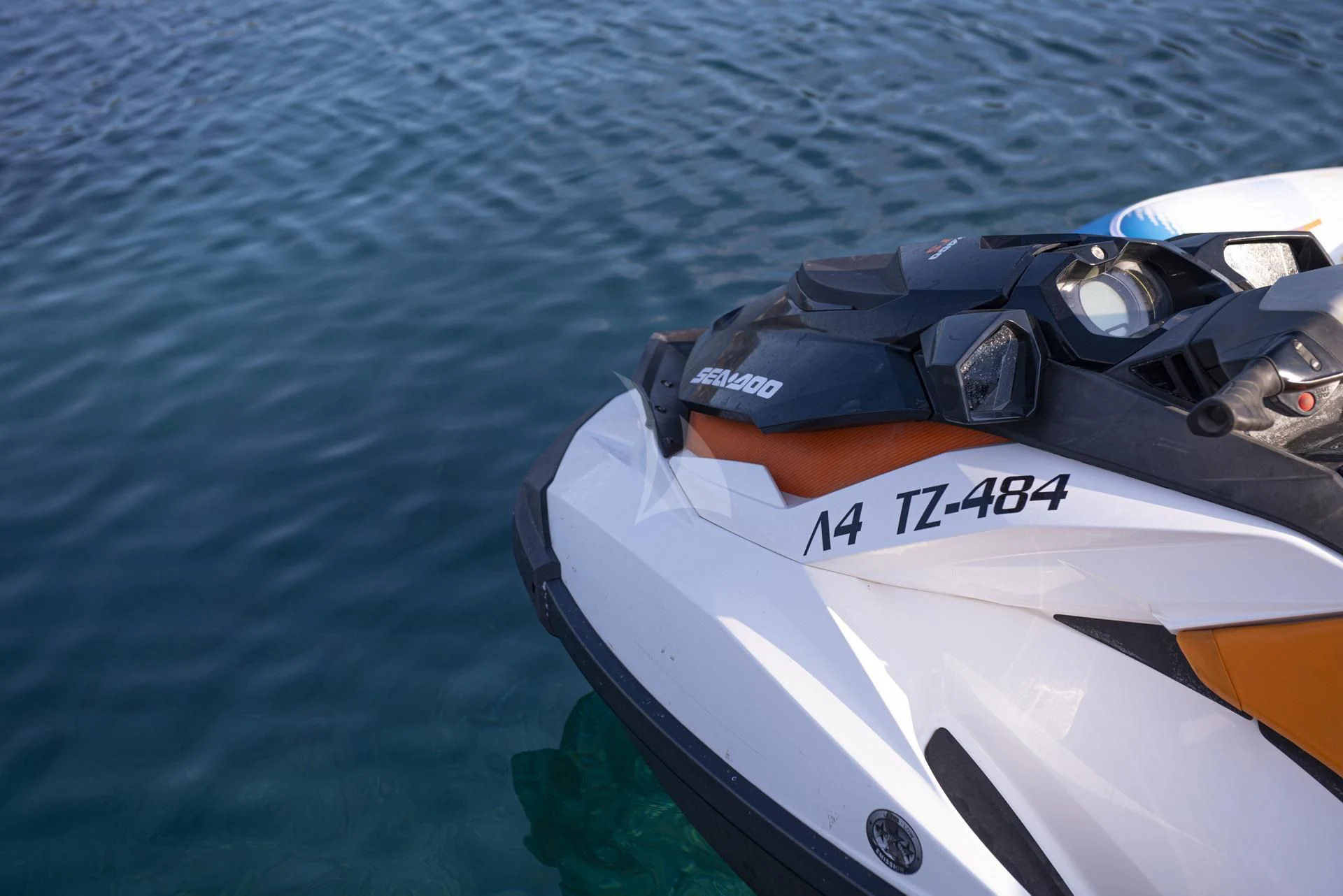 a speed boat on the water aboard WISH Yacht for Sale