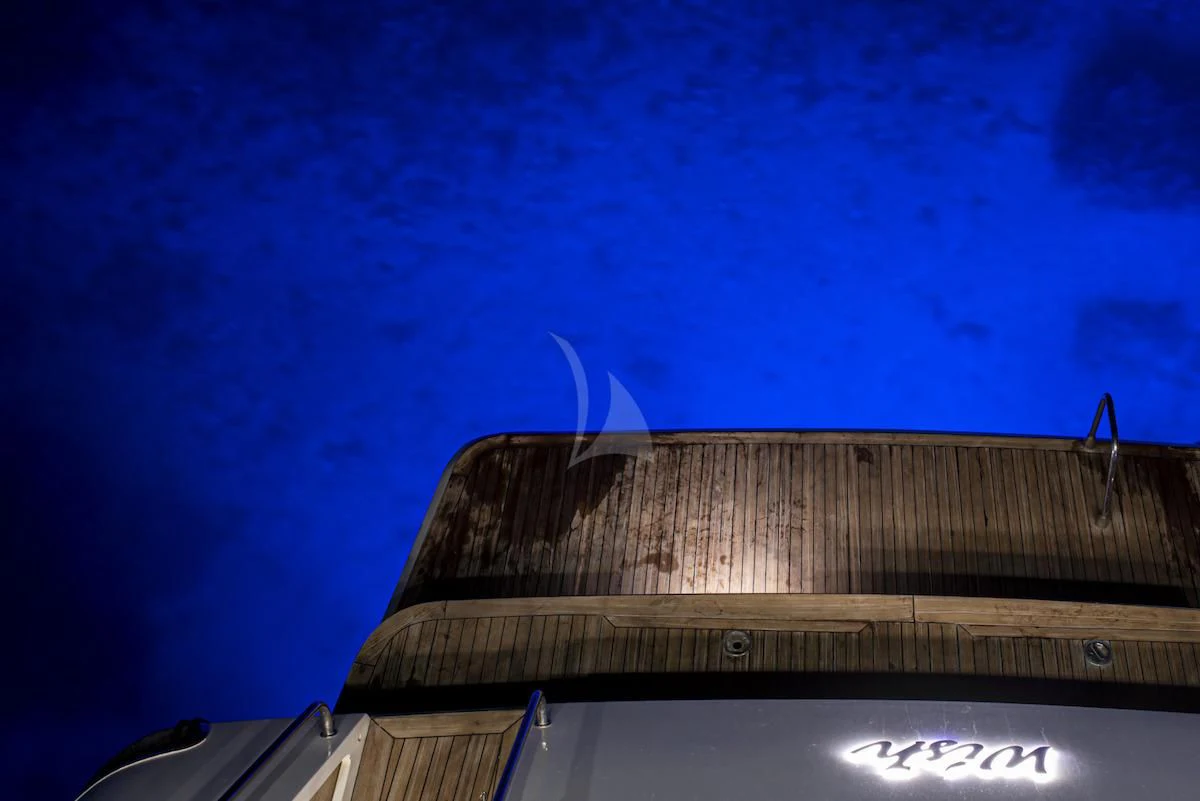 a view of the top of a building with a blue sky aboard WISH Yacht for Sale