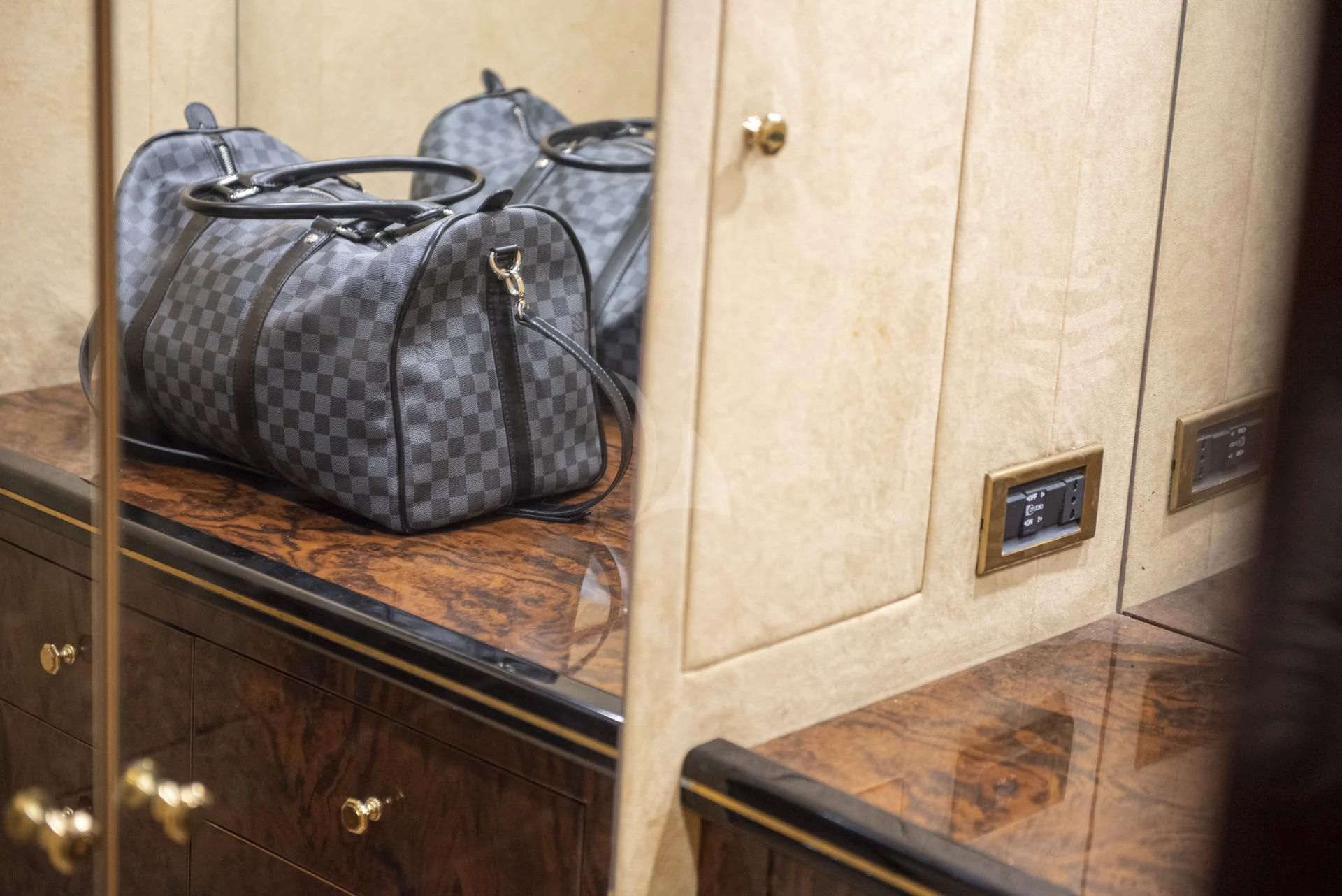 a backpack on a counter aboard WISH Yacht for Sale