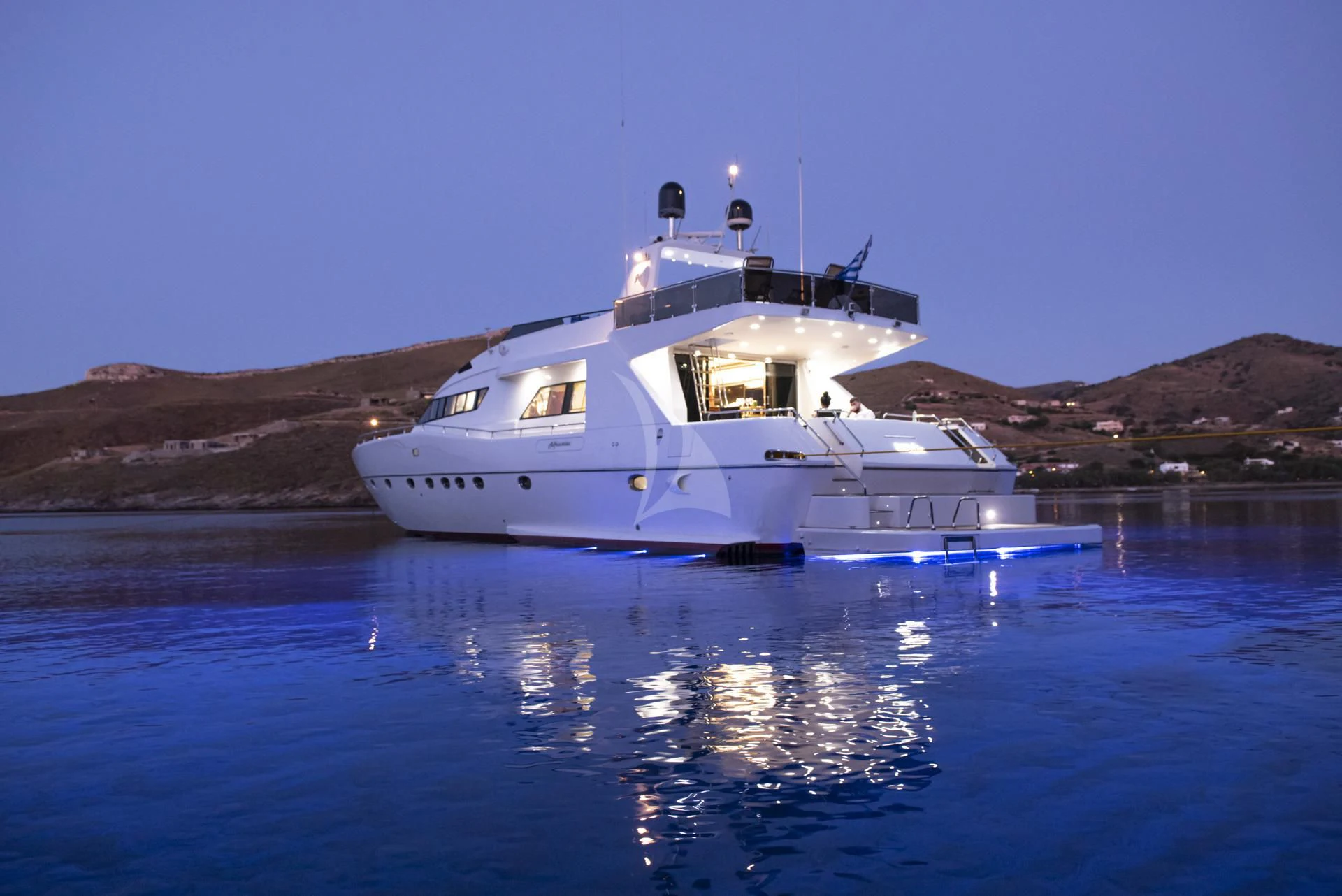 a white boat on water aboard WISH Yacht for Sale