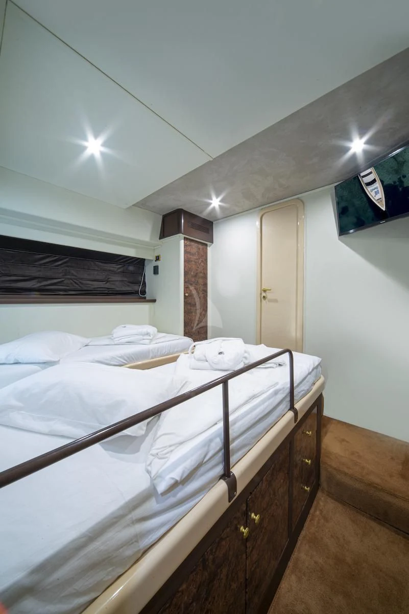 a room with bunk beds aboard WISH Yacht for Sale