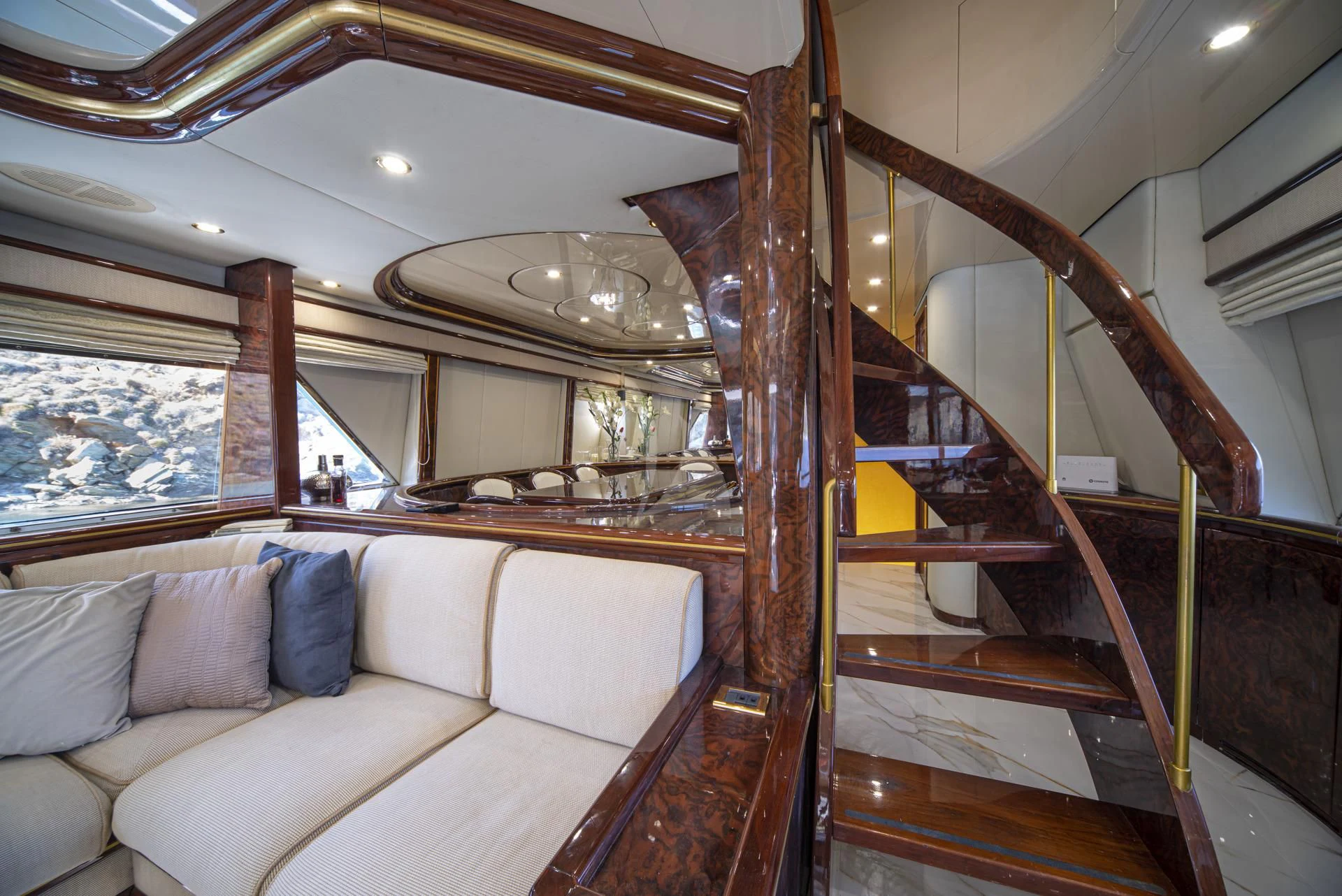 a room with a couch and a bed aboard WISH Yacht for Sale