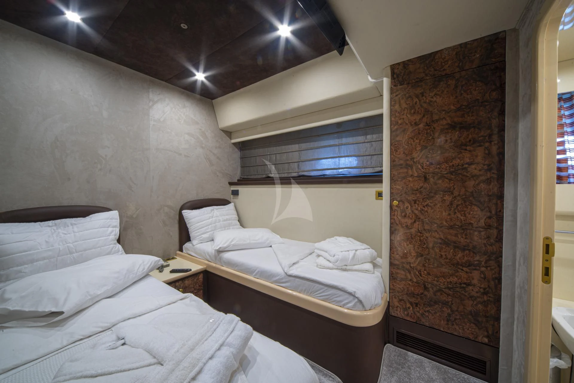 a room with two beds aboard WISH Yacht for Sale