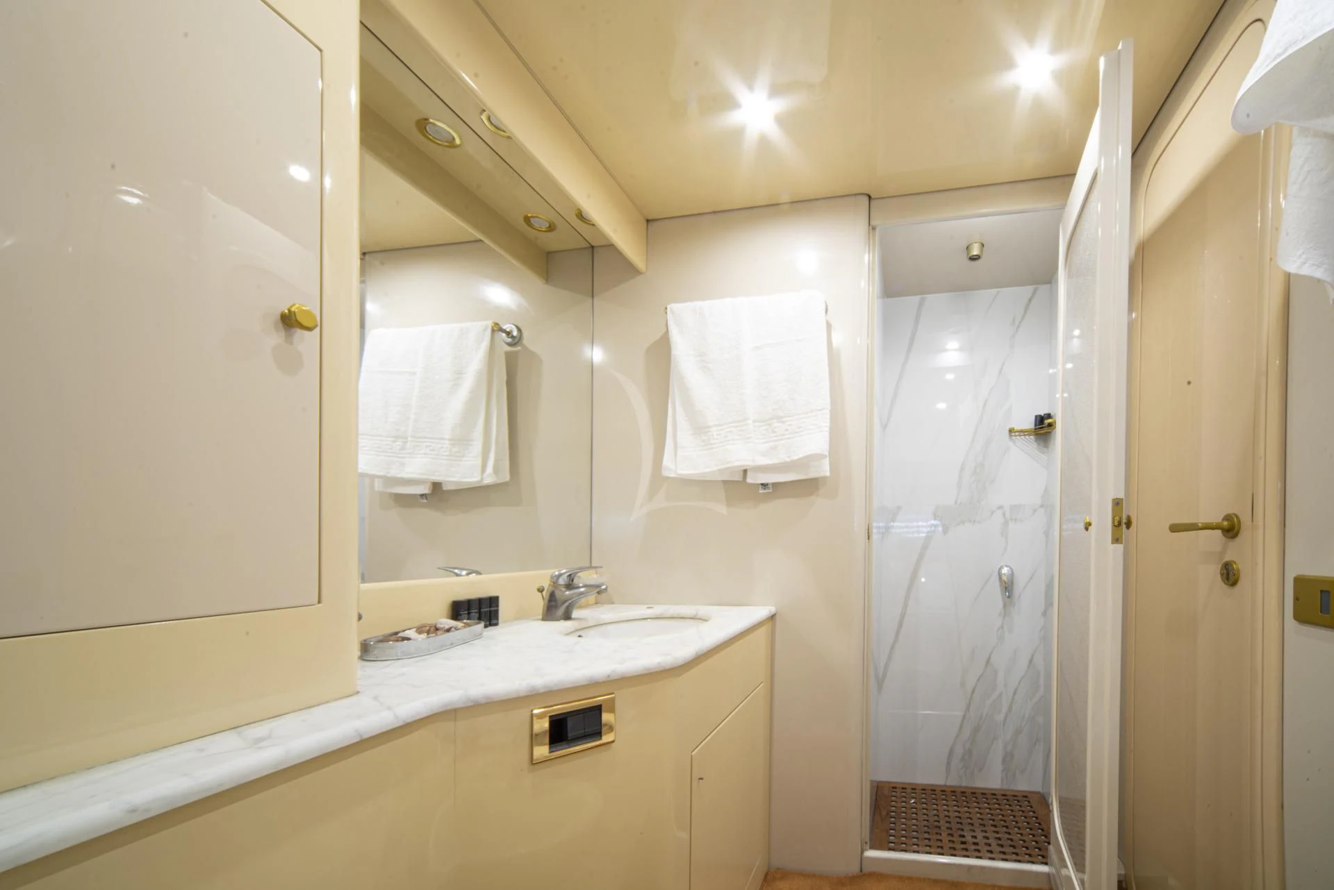 a bathroom with a sink and a mirror aboard WISH Yacht for Sale