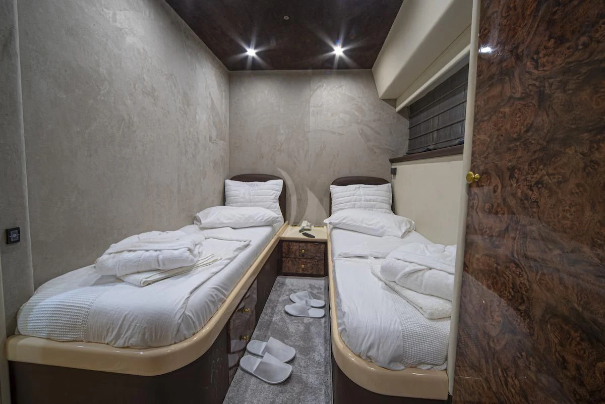 a couple of beds in a room aboard WISH Yacht for Sale