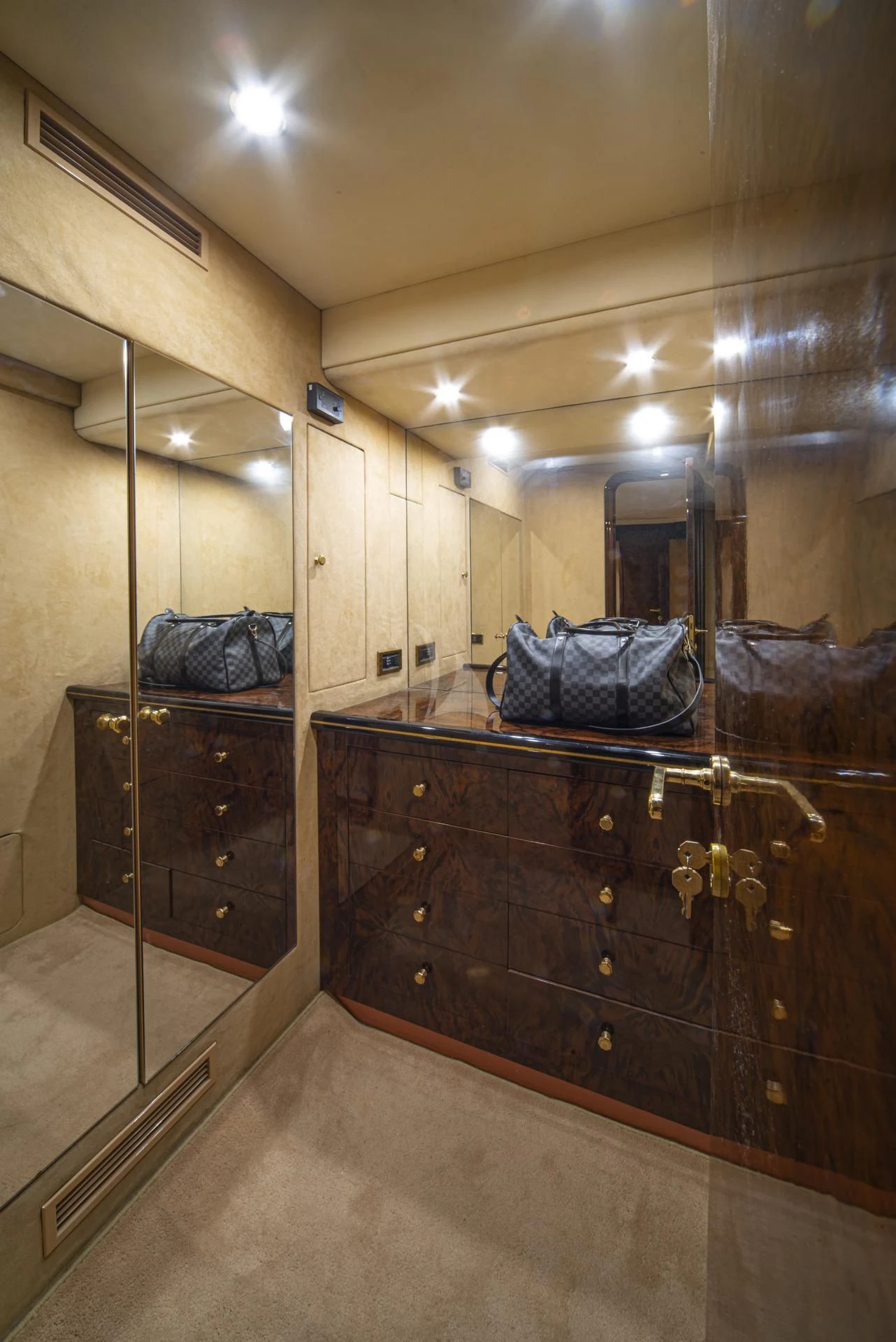 a bathroom with a large mirror aboard WISH Yacht for Sale