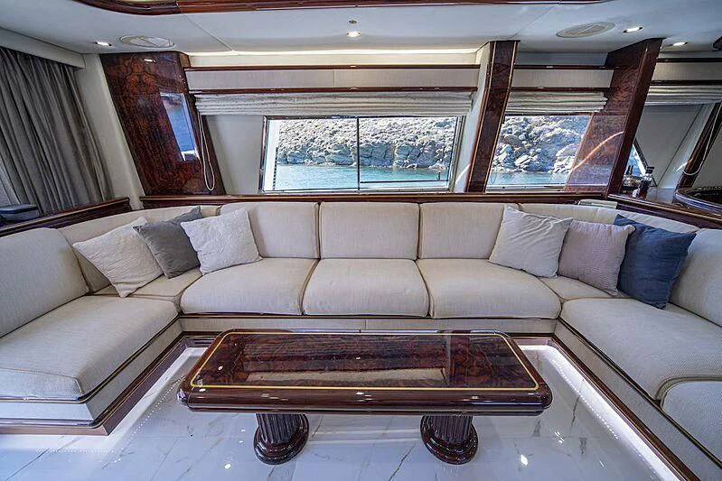 a couch in a room aboard WISH Yacht for Sale