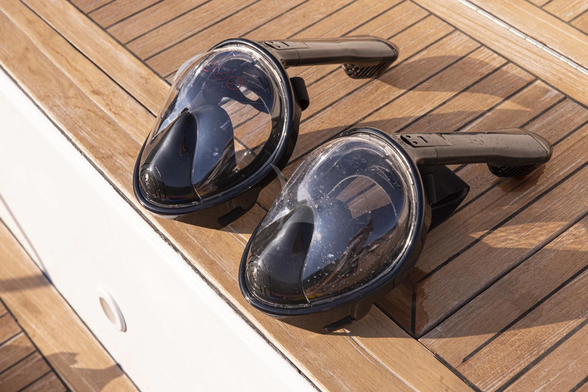 a pair of headphones on a table aboard WISH Yacht for Sale